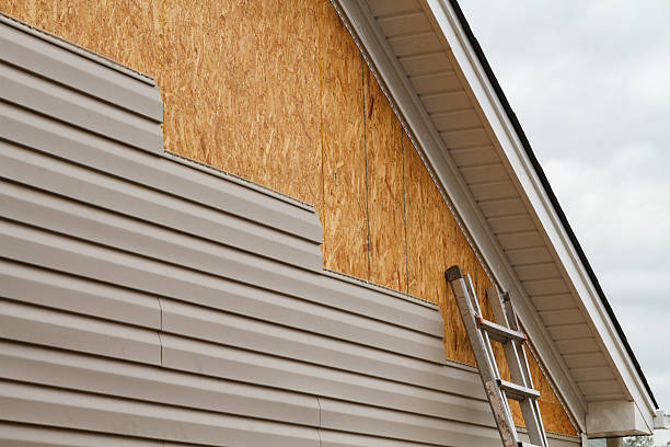 Professional Siding Contractor technician working in Dayton, MD